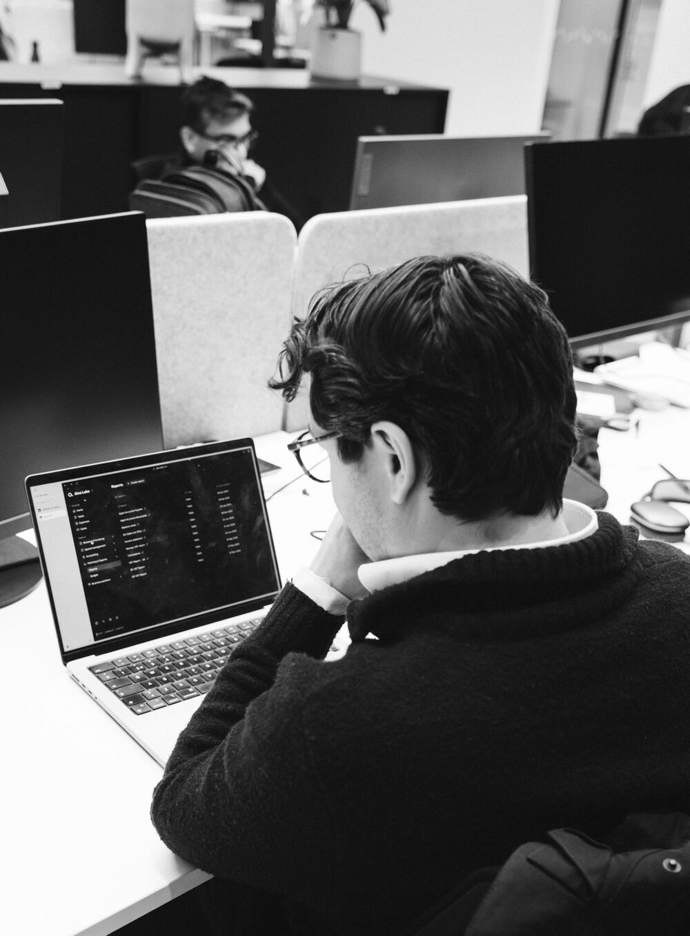Thobias Cogrell working at his laptop in the Alva Labs office