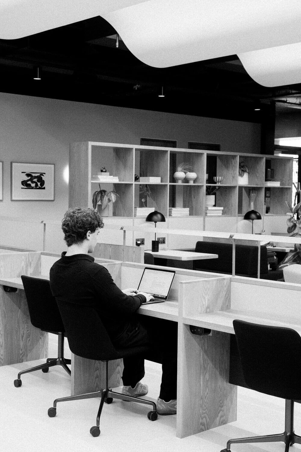 An open-plan office with rows of desks